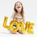Balon folia mini napis &bdquo;LOVE&rdquo; &ndash; złoty